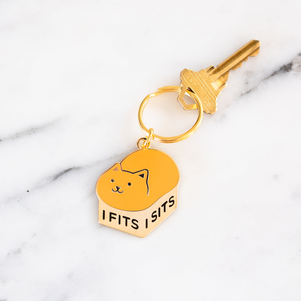 
            
                Load image into Gallery viewer, I Fits I Sits Keychain
            
        